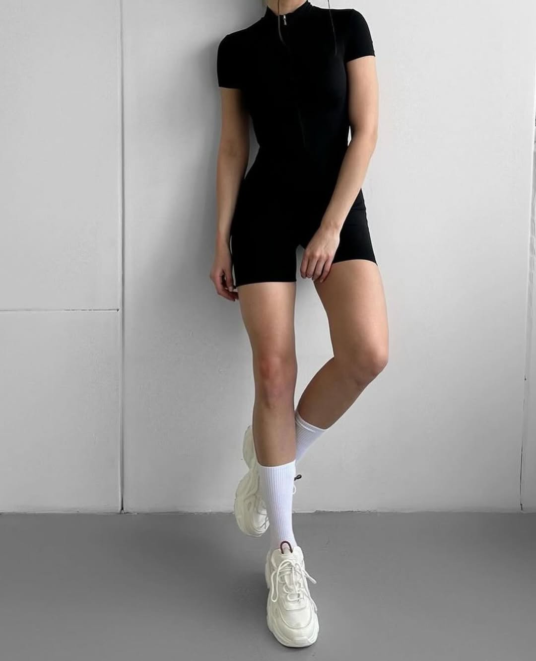 Pantera Short-Sleeve Zip Romper in Black