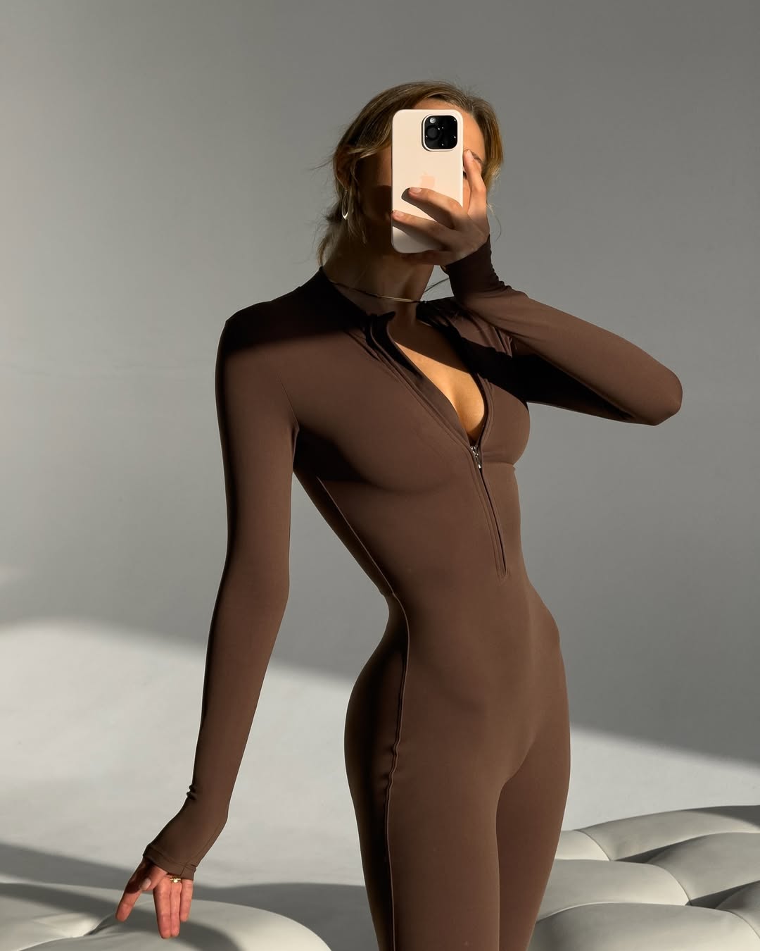 Nova Zip-Front Long-Sleeve Jumpsuit in Brown