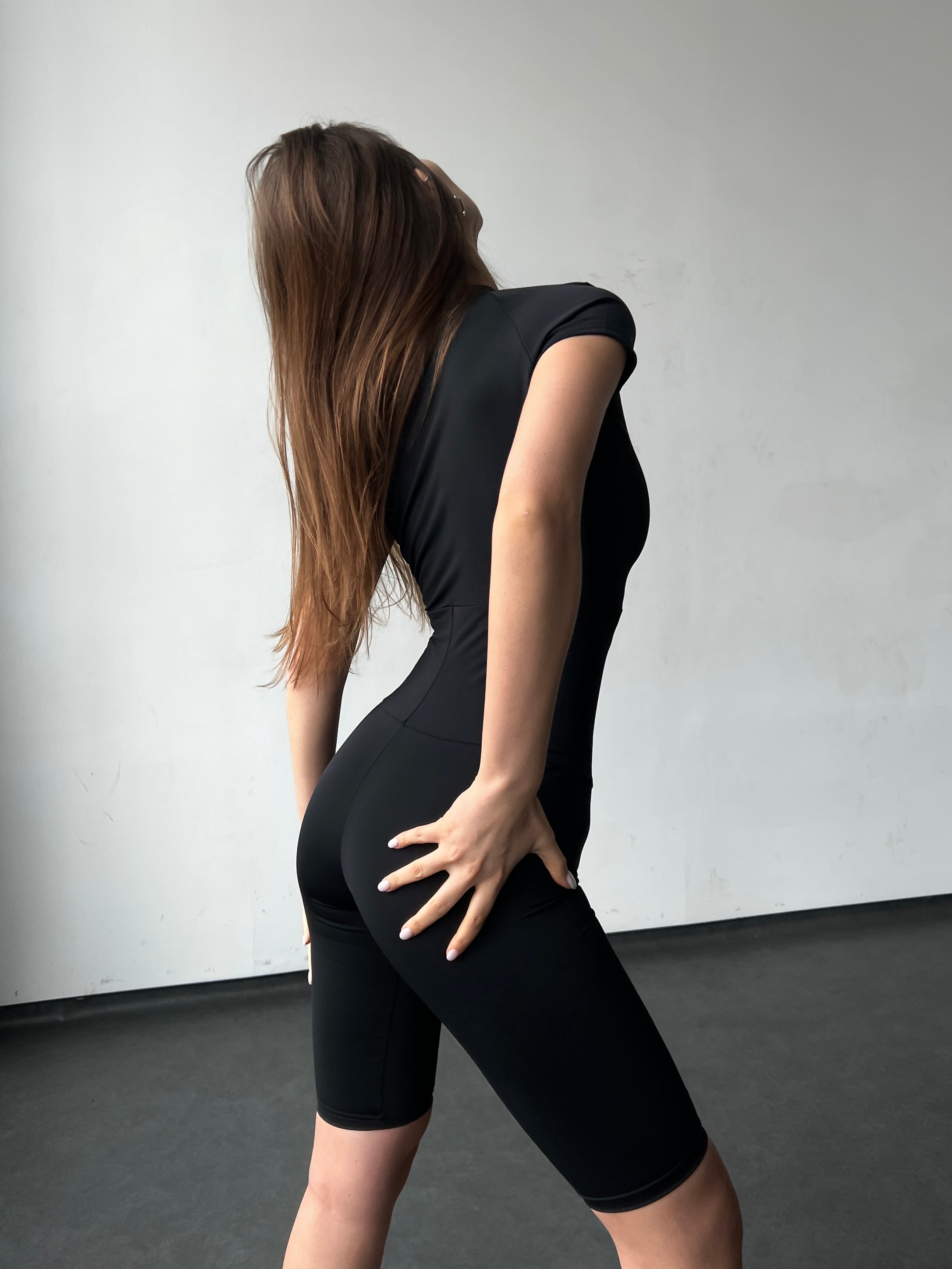 Sculpt Zip Performance Jumpsuits in Black