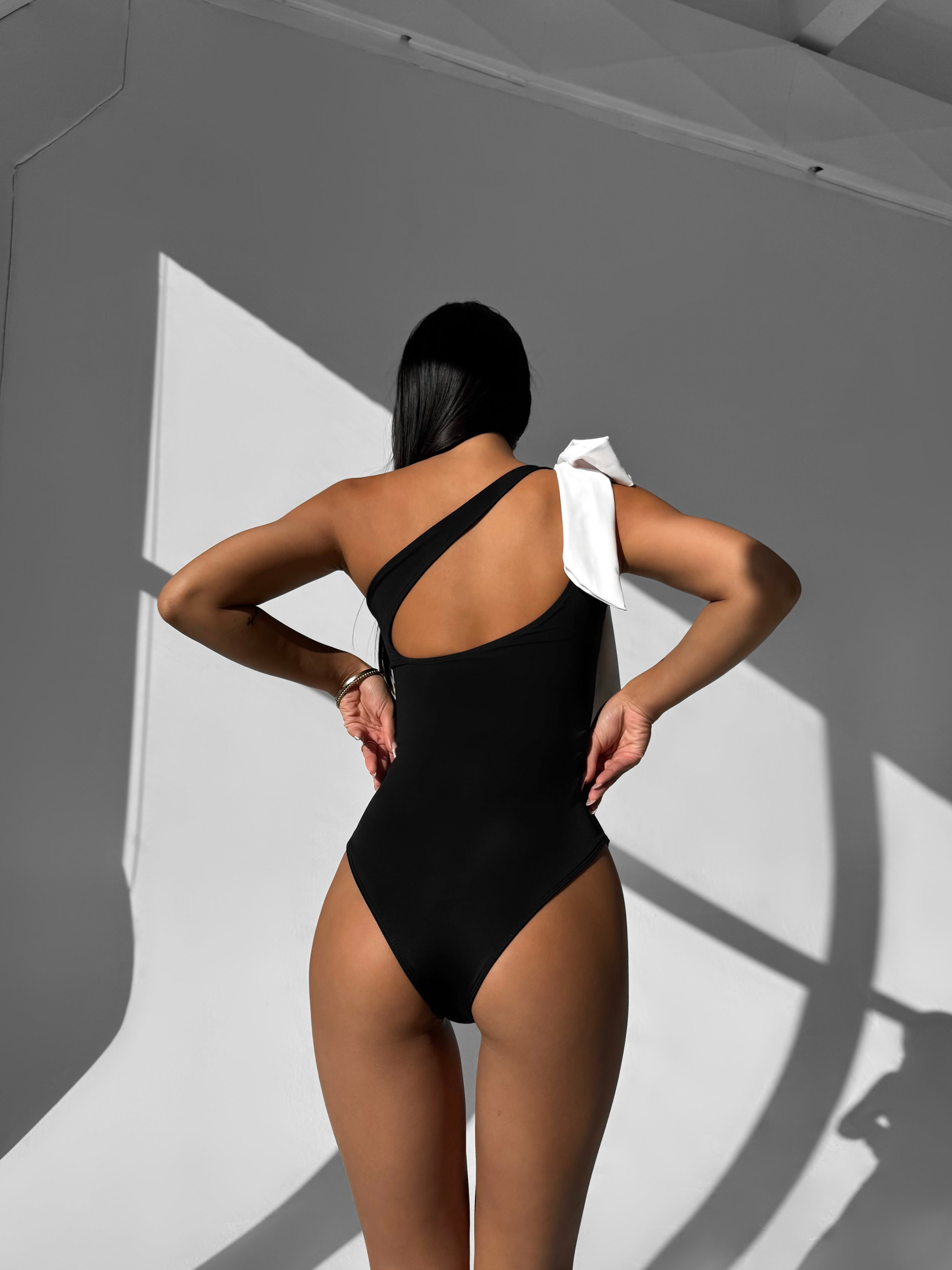 Muse Bow Asymmetric One Piece in Black
