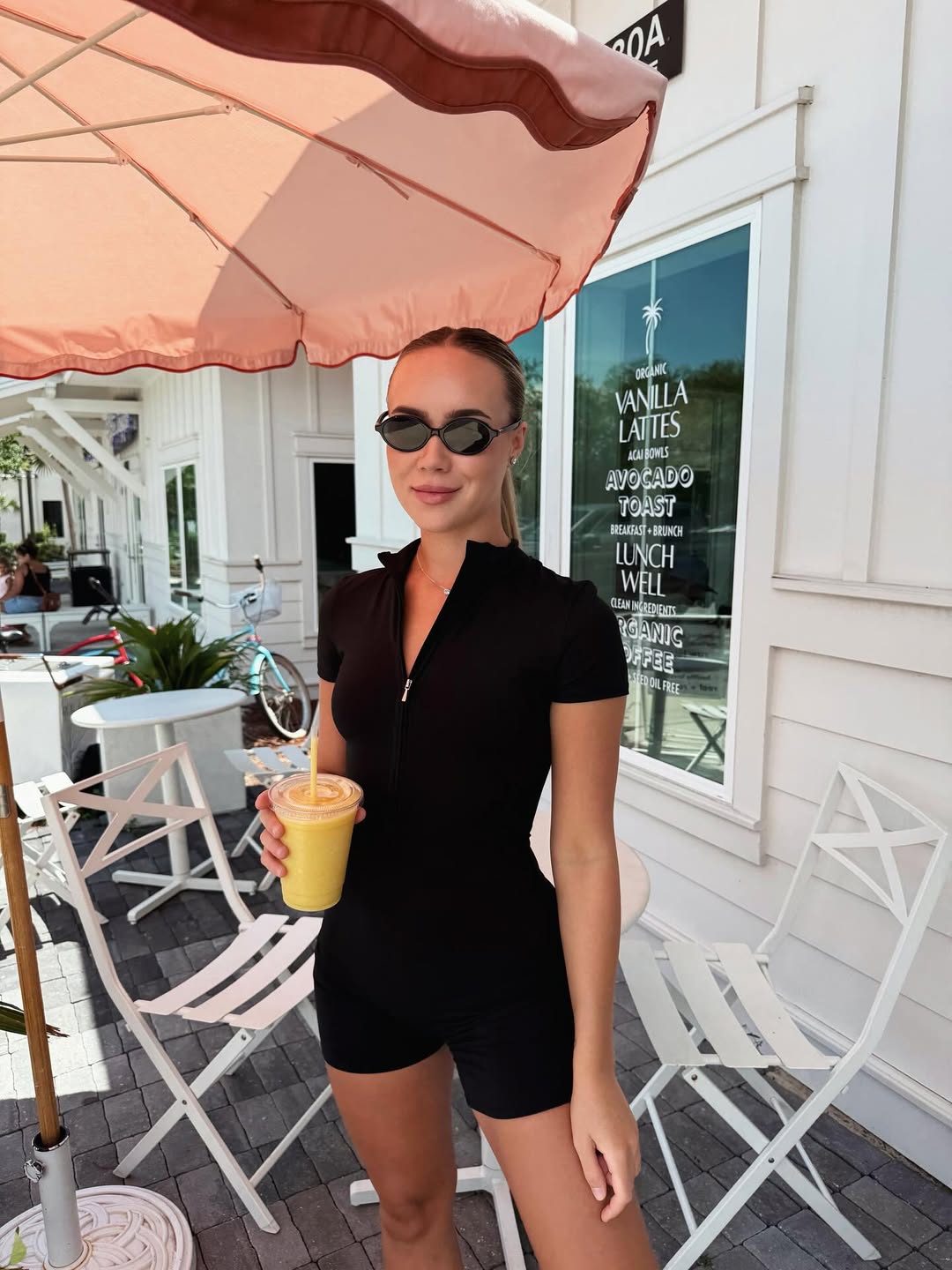 Nova Short-Sleeve Zip Romper in Black