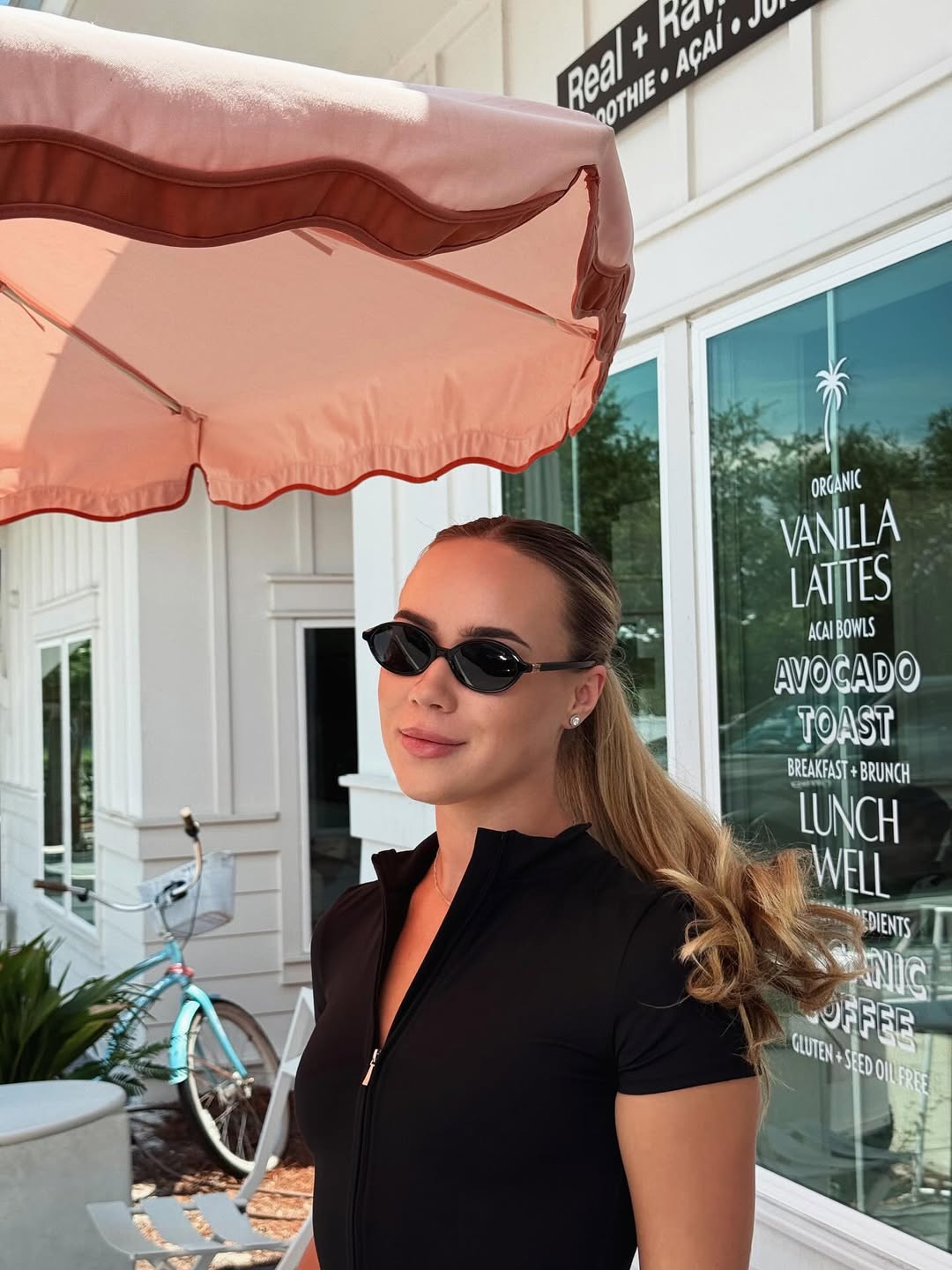 Nova Short-Sleeve Zip Romper in Black