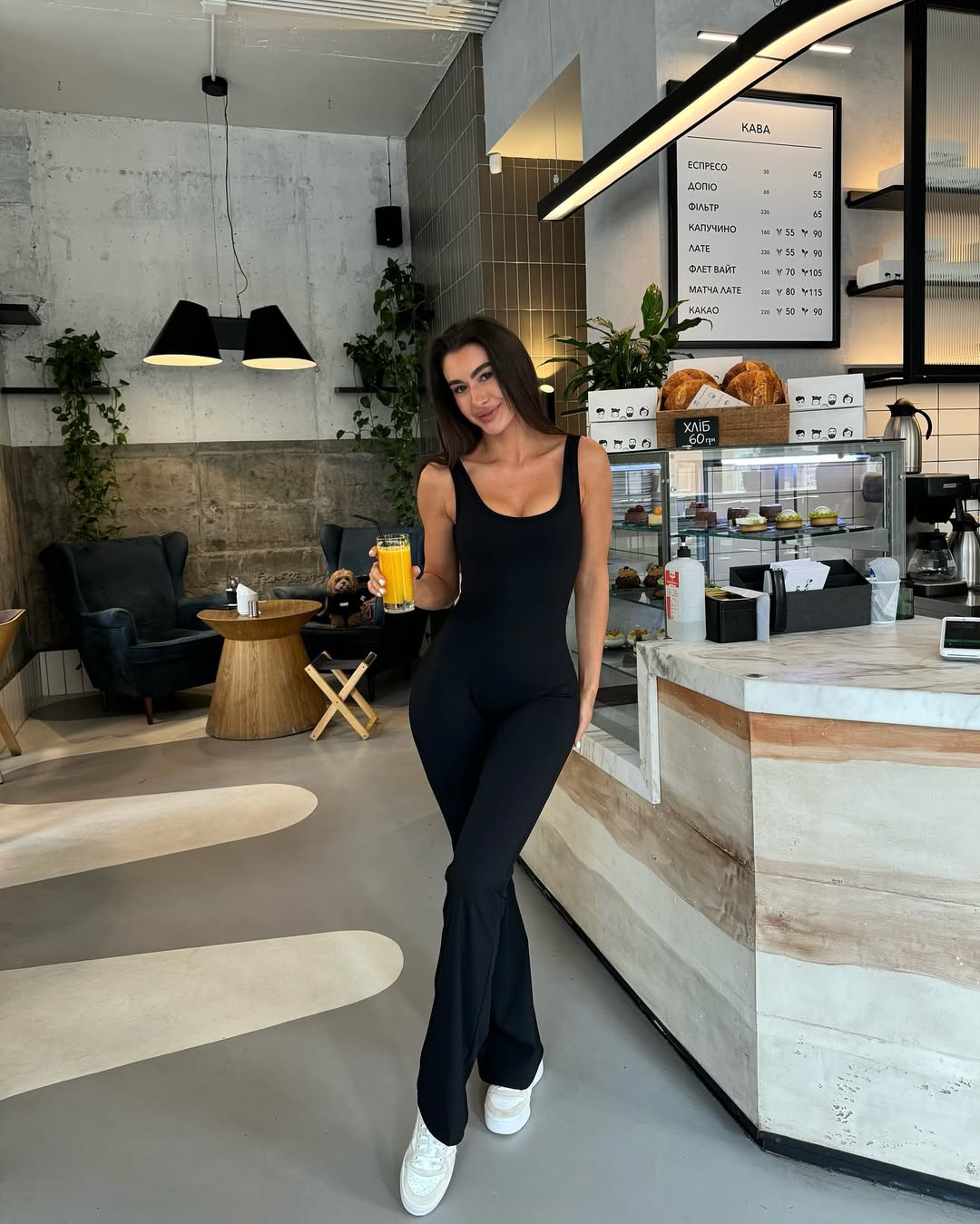 Flex Cut-Out Flared Jumpsuit in Black