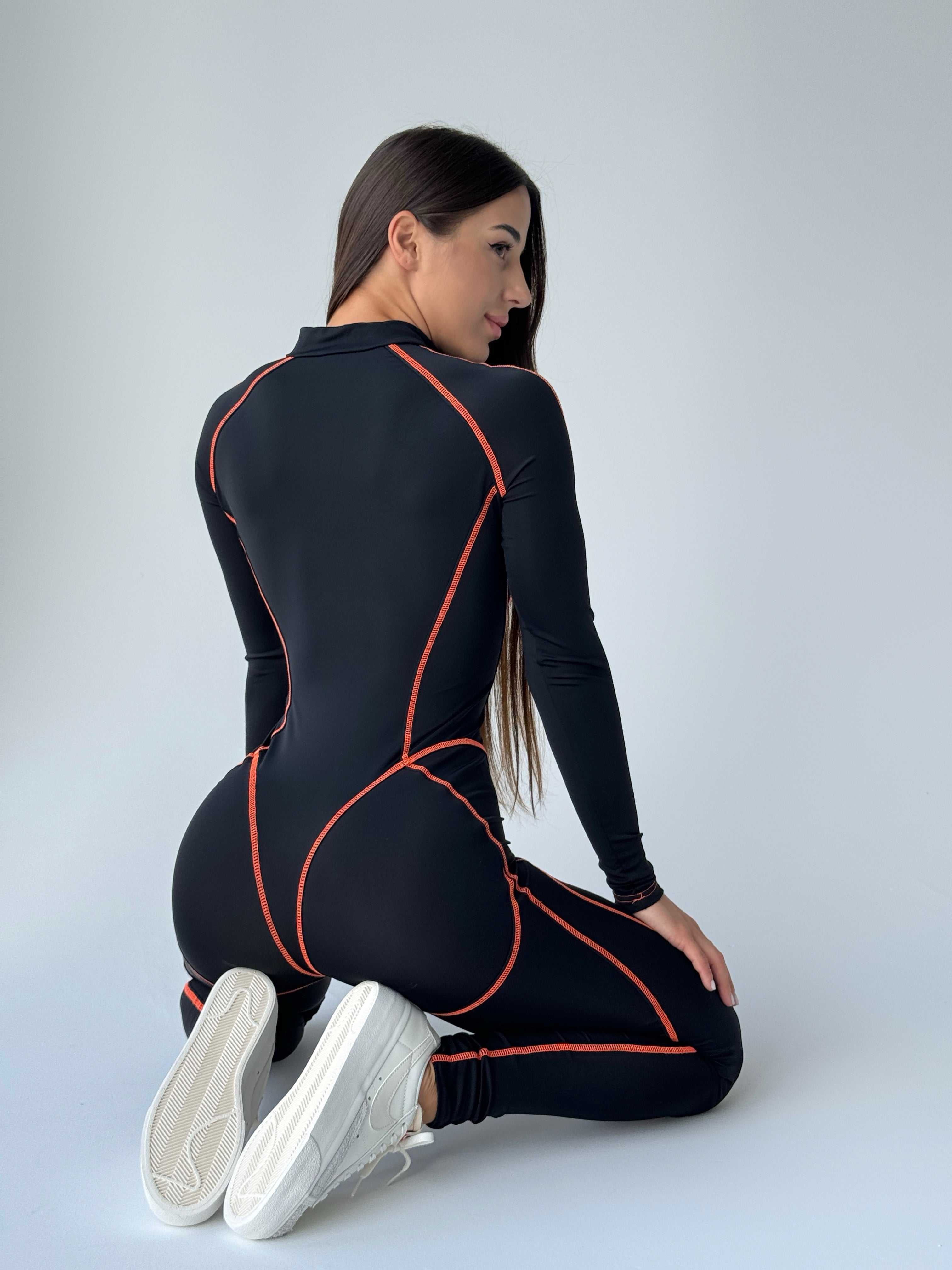 Galaxy Zip Contrast Contour Seam Long Sleeve Jumpsuit in Black and Neon Orange