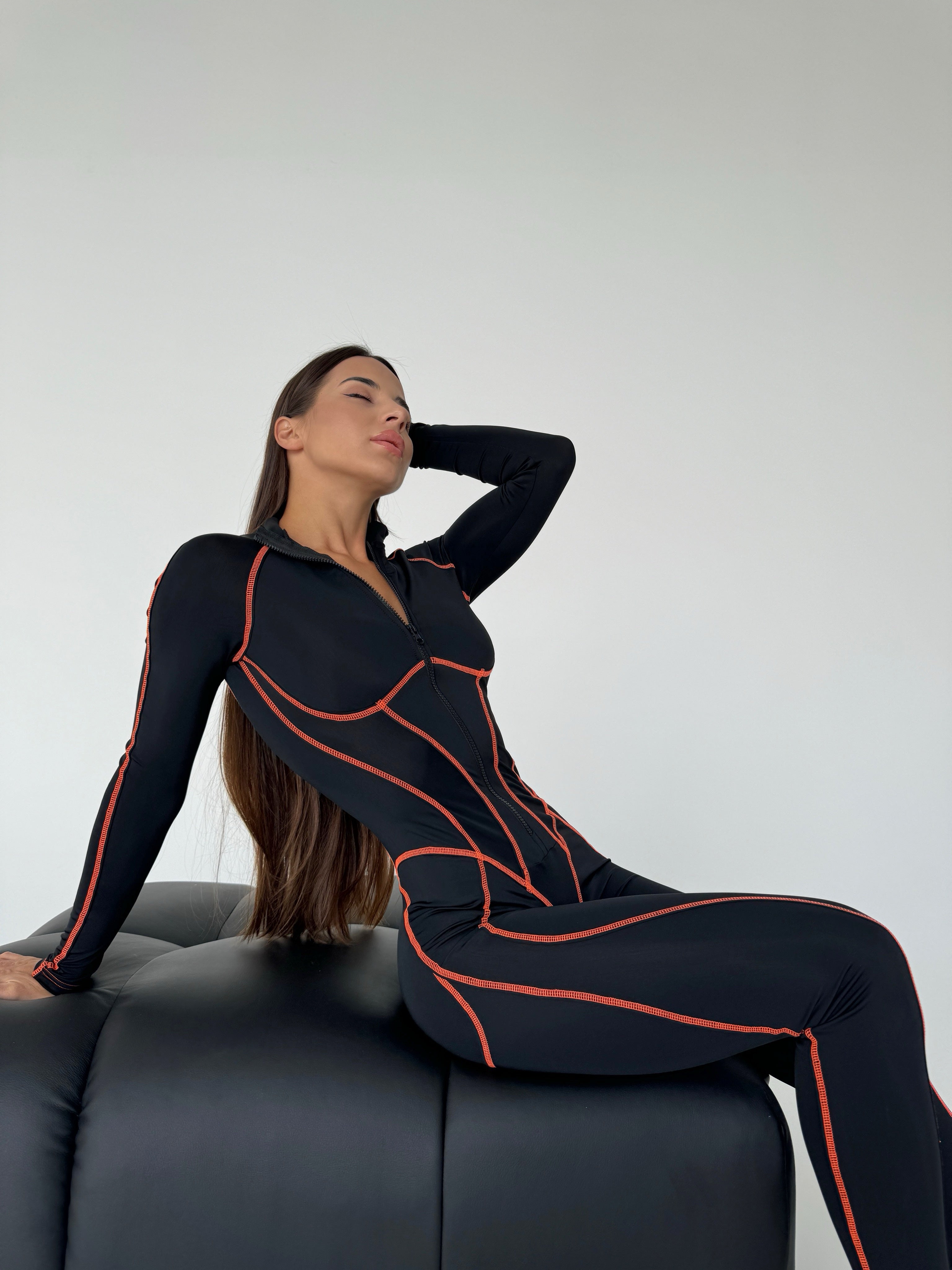 Galaxy Zip Contrast Contour Seam Long Sleeve Jumpsuit in Black and Neon Orange