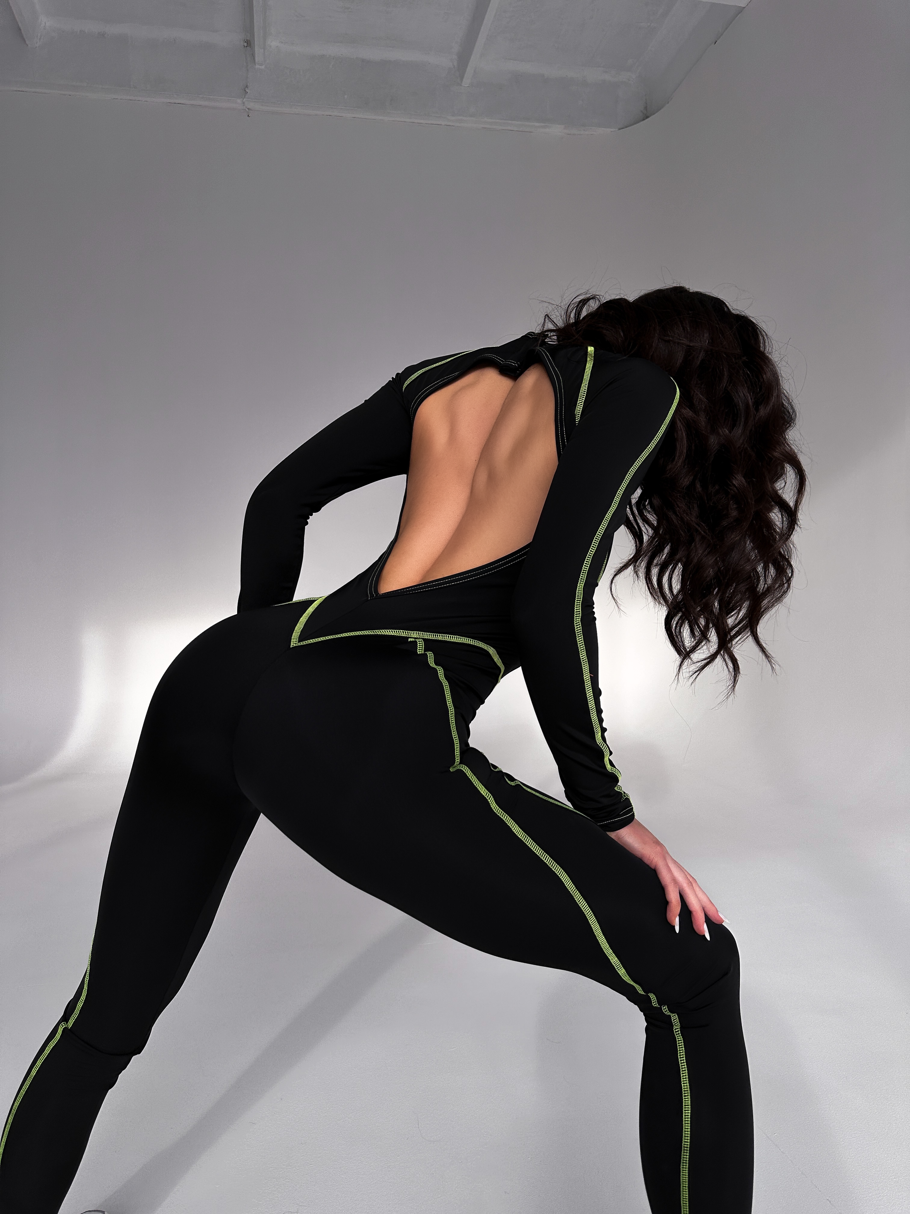 Galaxy Contour Seam Open Back Long Sleeve Jumpsuit in Black and Neon Green