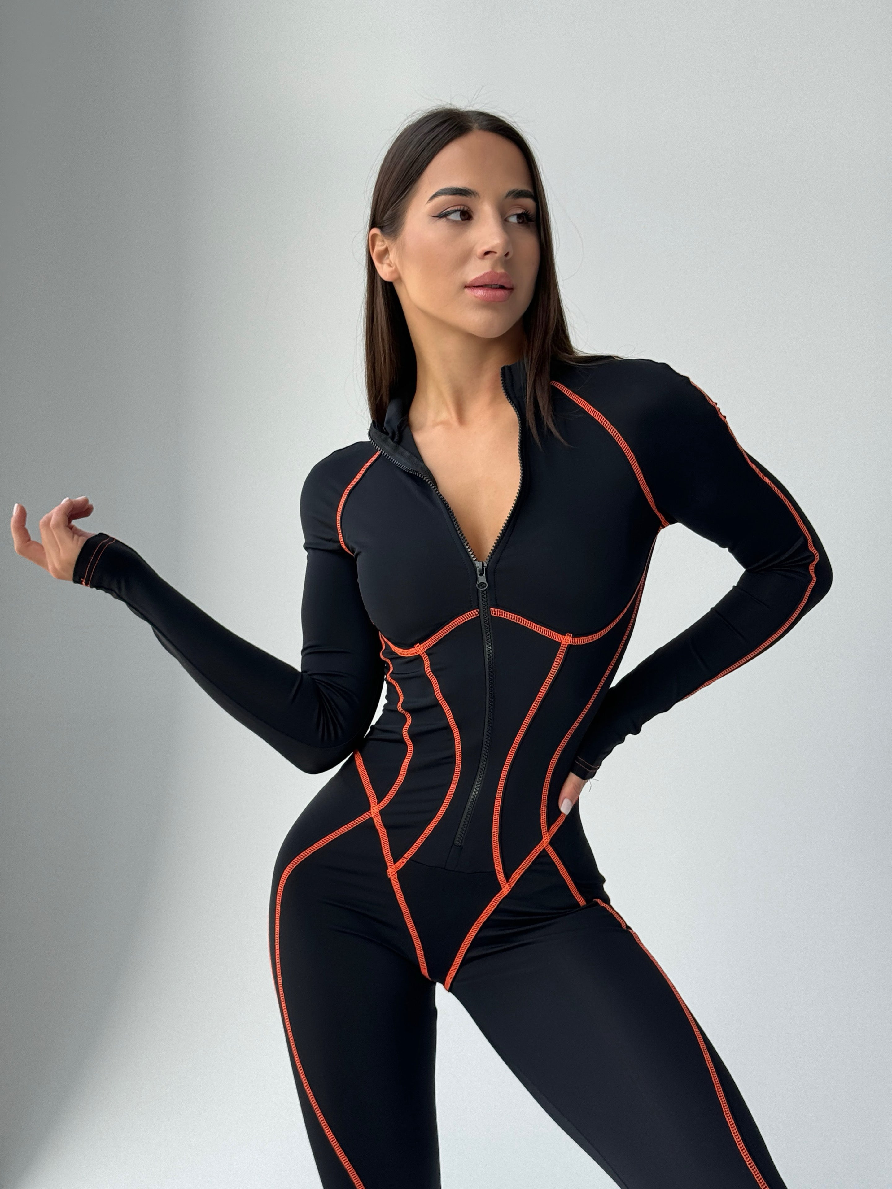 Galaxy Zip Contrast Contour Seam Long Sleeve Jumpsuit in Black and Neon Orange