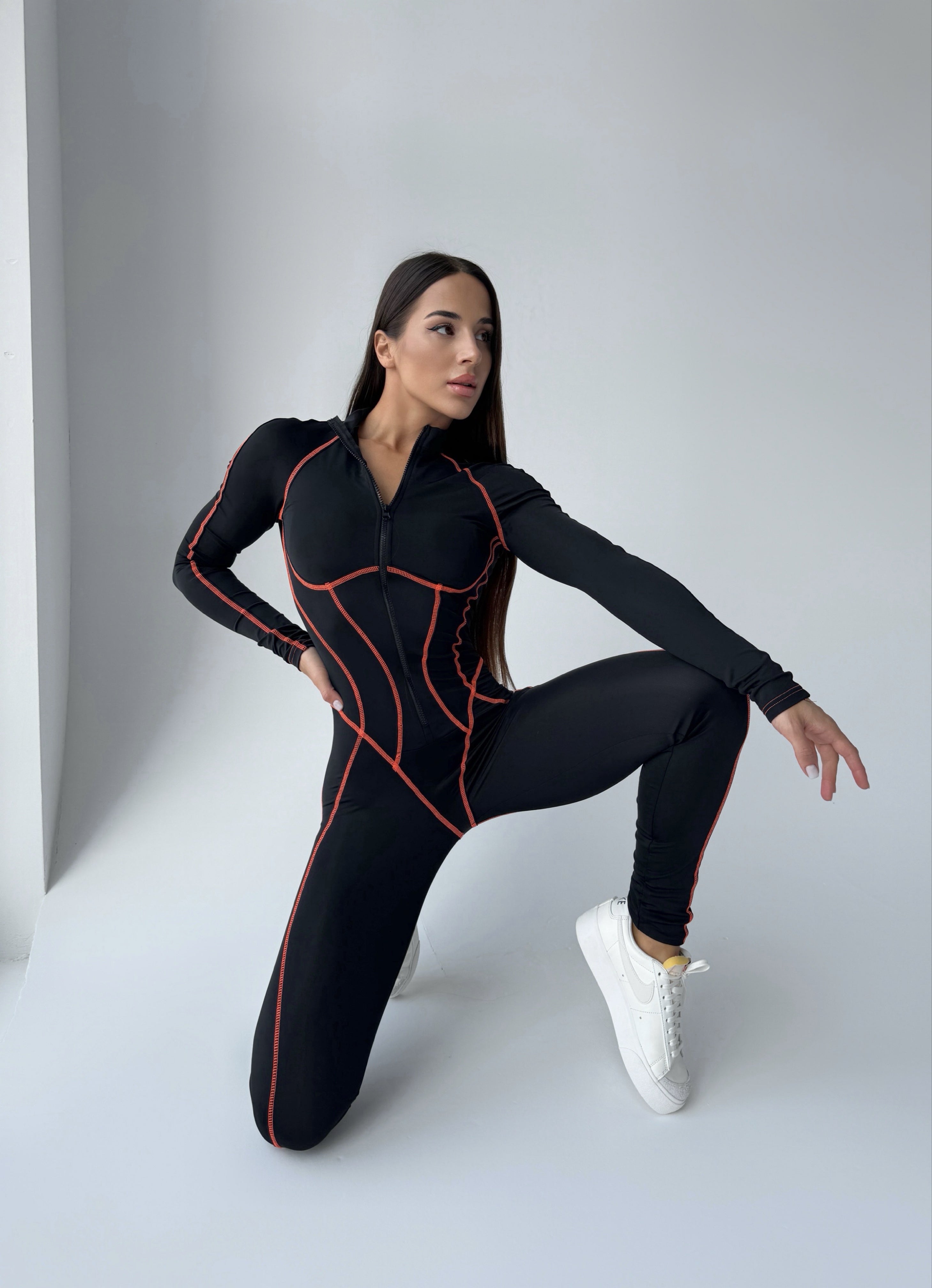 Galaxy Zip Contrast Contour Seam Long Sleeve Jumpsuit in Black and Neon Orange