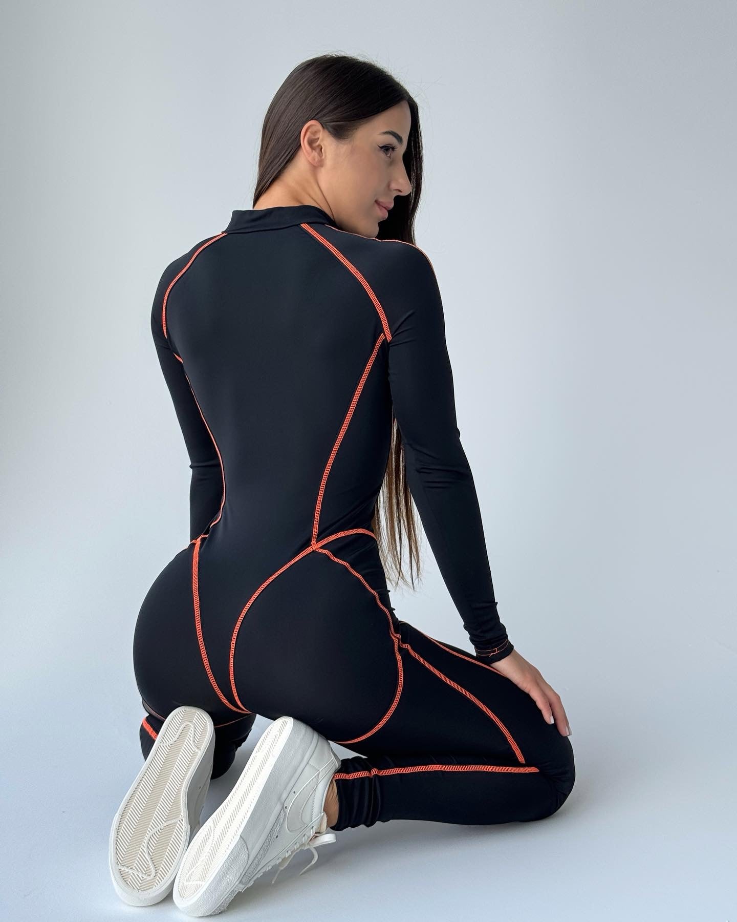 Galaxy Zip Contrast Contour Seam Long Sleeve Jumpsuit in Black and Neon Orange