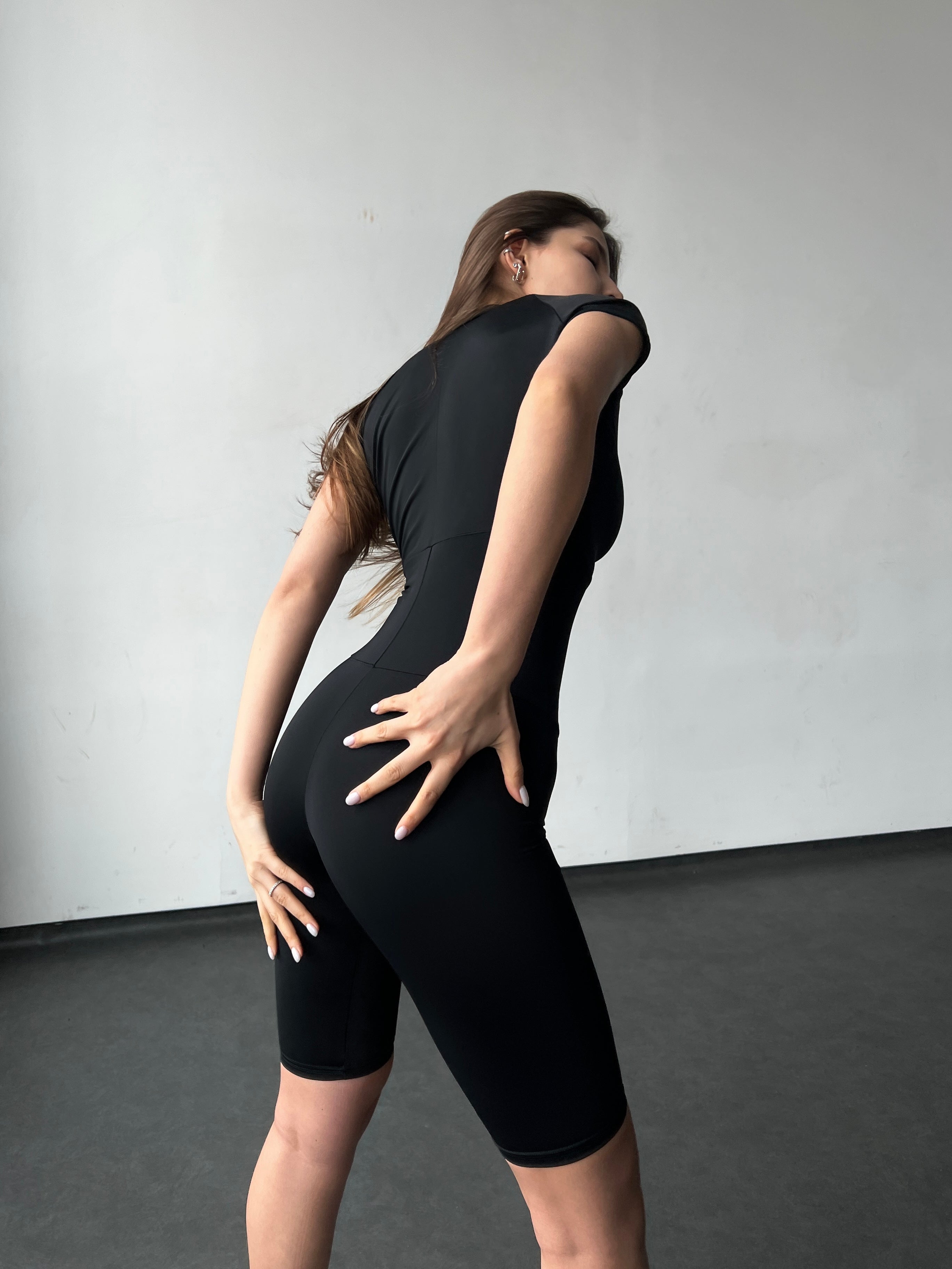 Sculpt Zip Performance Jumpsuits in Black