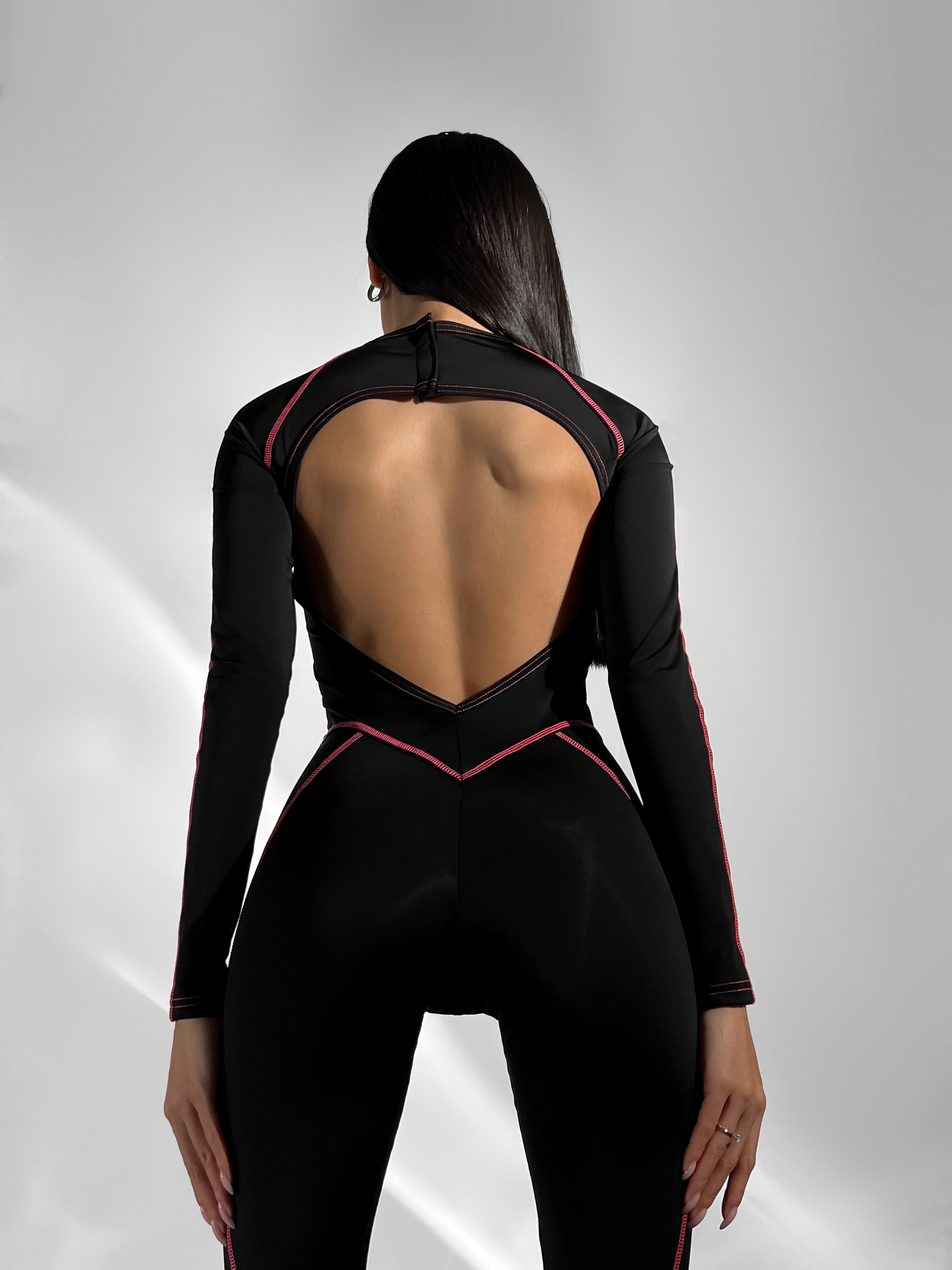 Galaxy Contour Seam Open Back Long Sleeve Jumpsuit in Black and Neon Pink