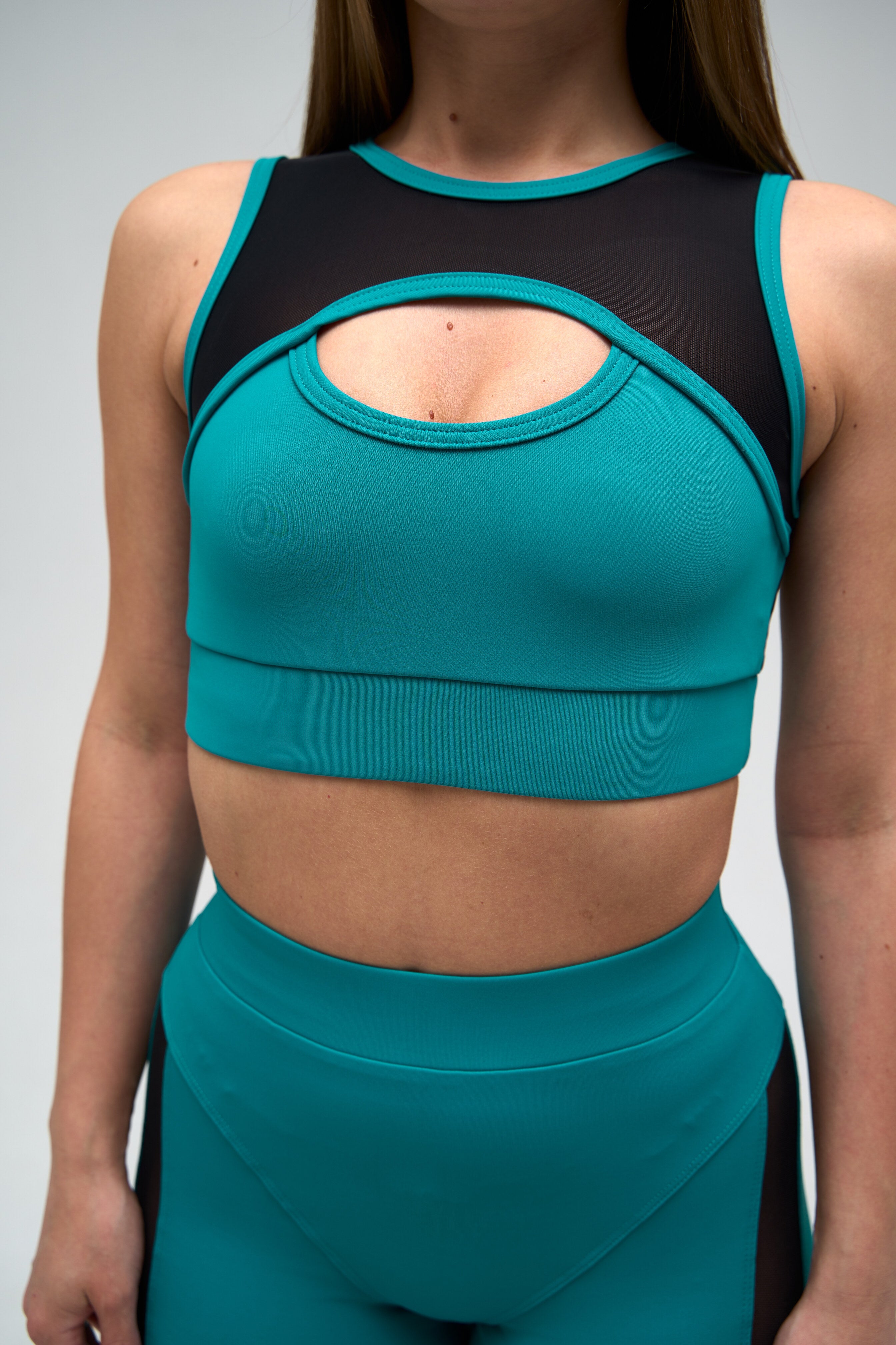 Galaxy Mesh Insert Cut Out Sleeveless Cropped Top in Turquoise