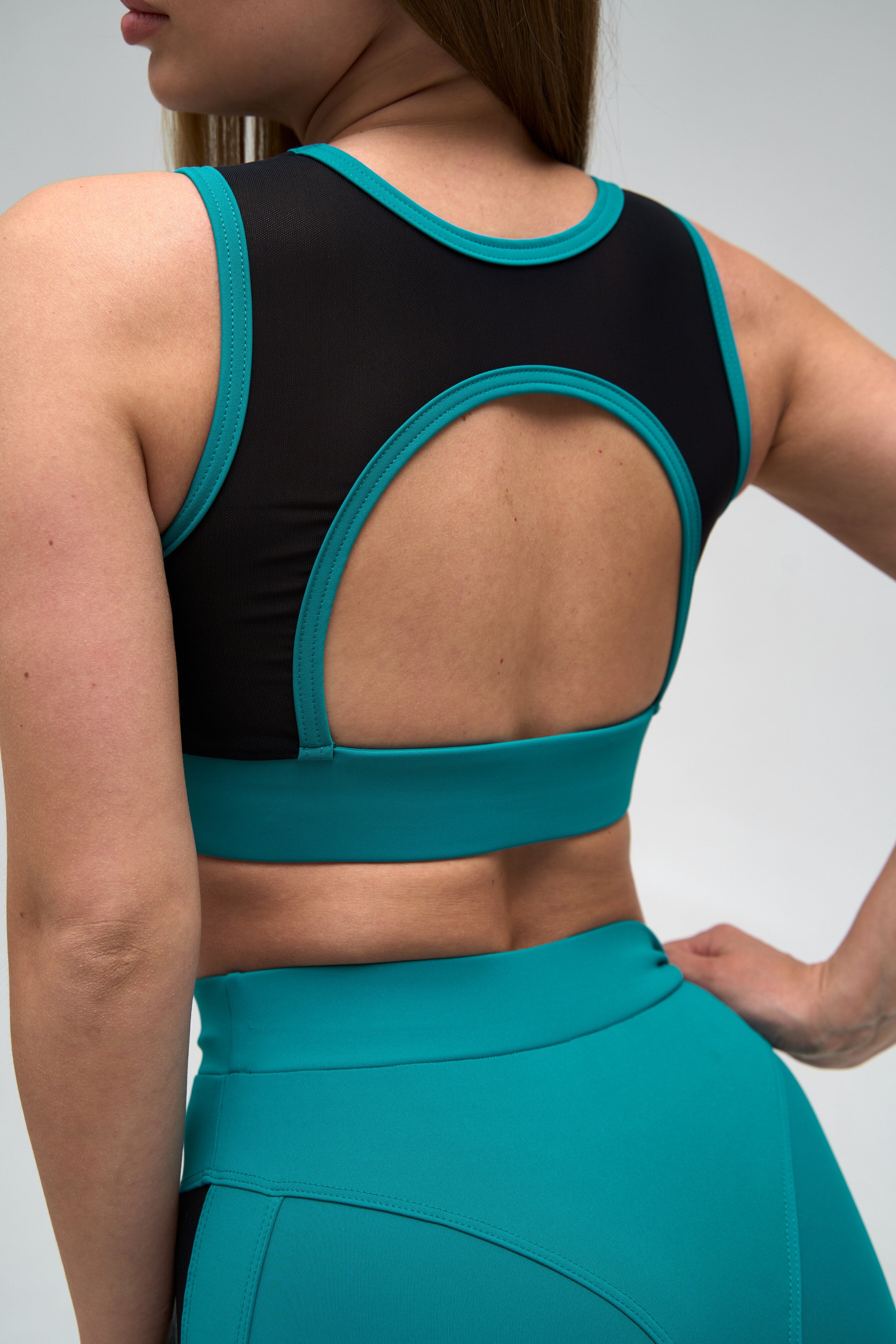 Galaxy Mesh Insert Cut Out Sleeveless Cropped Top in Turquoise